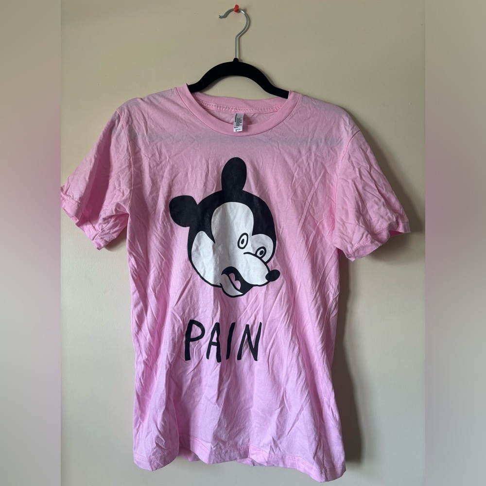 pain tee by artist Heather buchanan in size small. Tee is an American Apparel